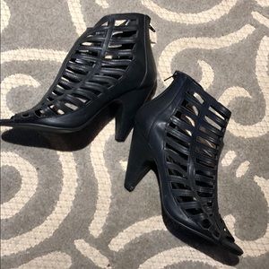 Heart in D peep toe booties.